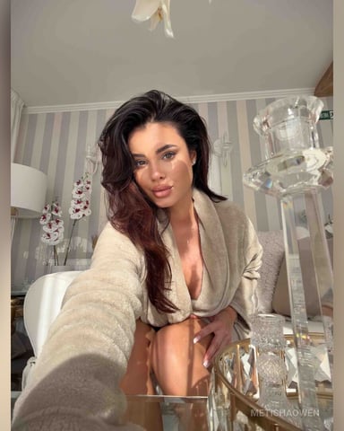 MetishaOwen photo